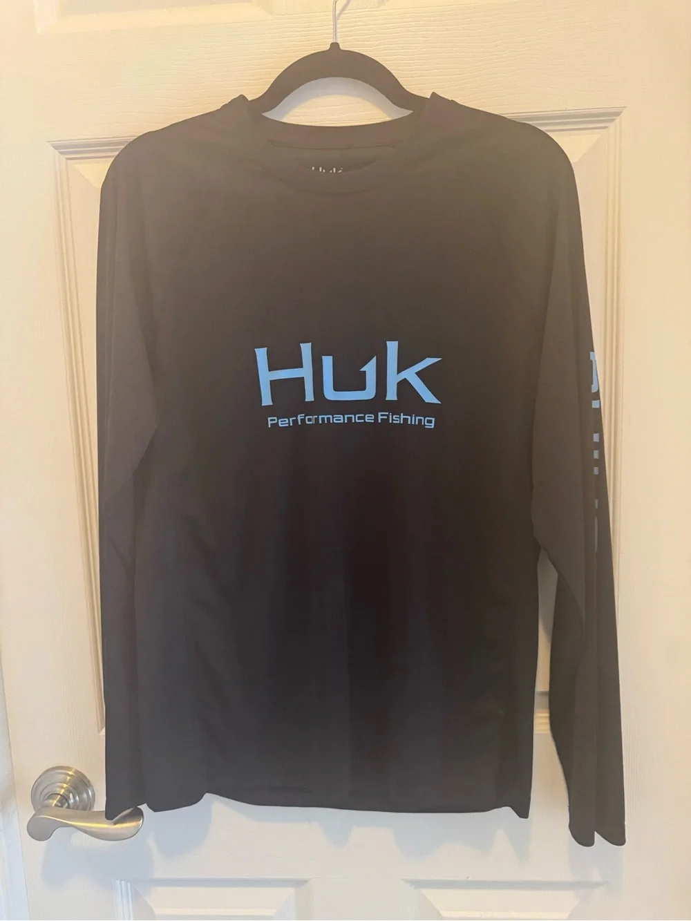 Huk Men's Black Long-Sleeve Performance Rash Guard with Blue Logo